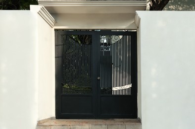 Entrance of residential house with black door