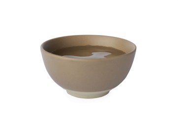 Photo of Bowl full of water on white background