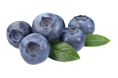 Photo of Many fresh ripe blueberries and leaves isolated on white