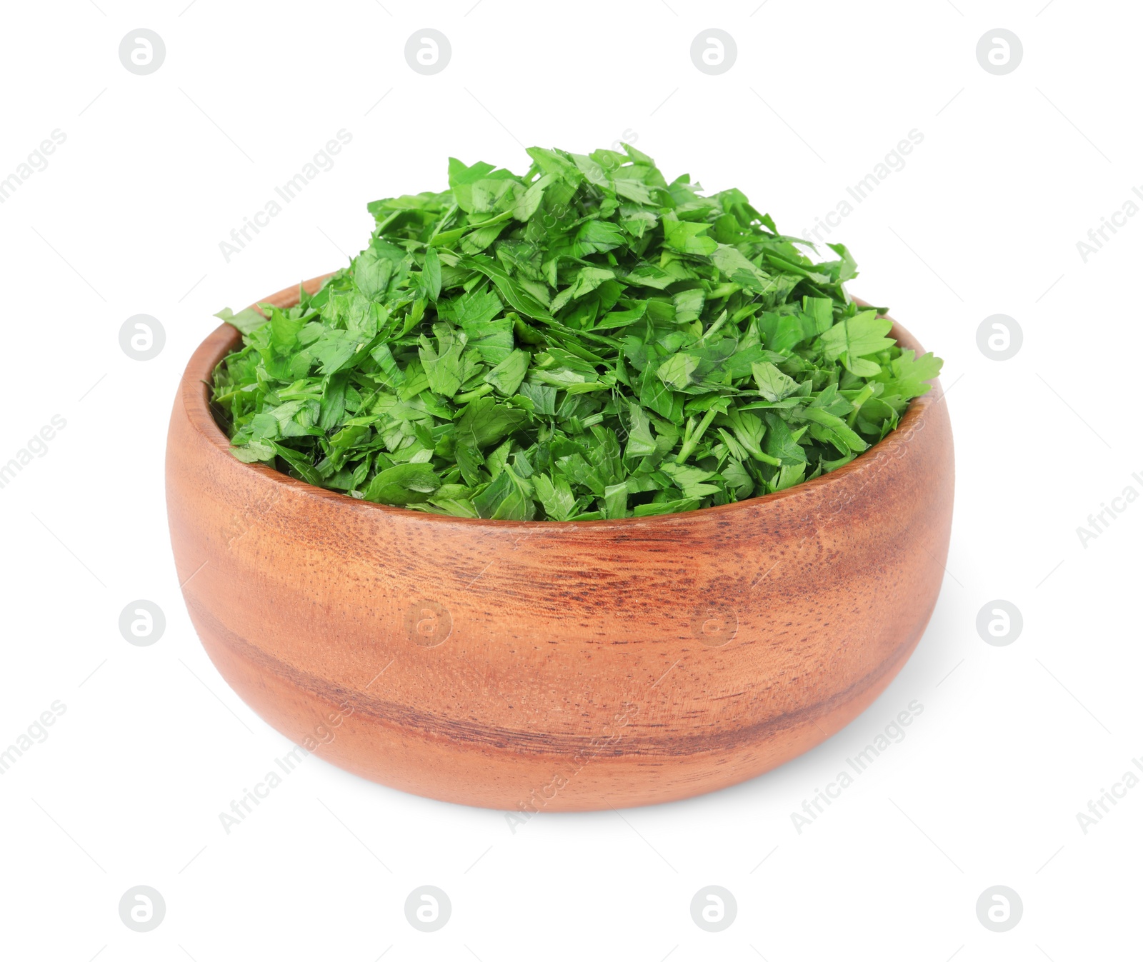 Chopped parsley leaves in wooden bowl isolated on white Photo of Chopped parsley leaves in wooden bowl isolated on white