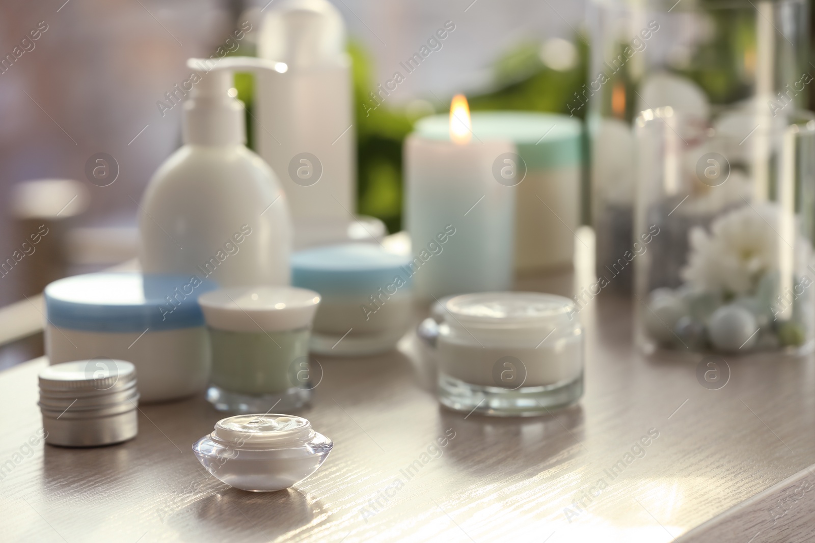 Photo of Set of body care cosmetics on table