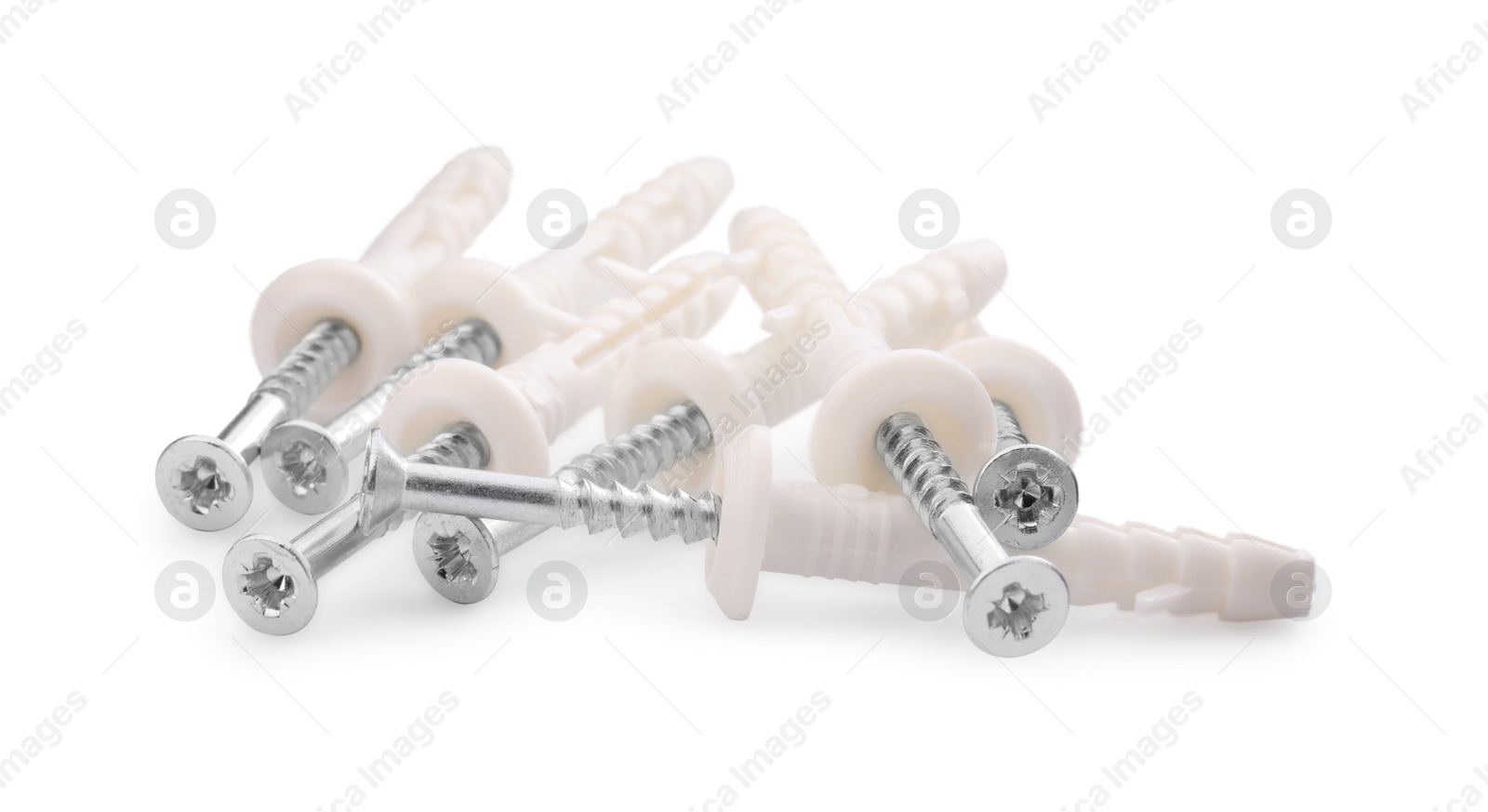 Photo of Screws with straddling dowels isolated on white
