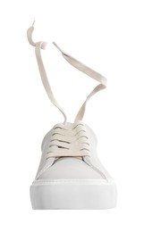 Photo of One stylish beige sneaker isolated on white