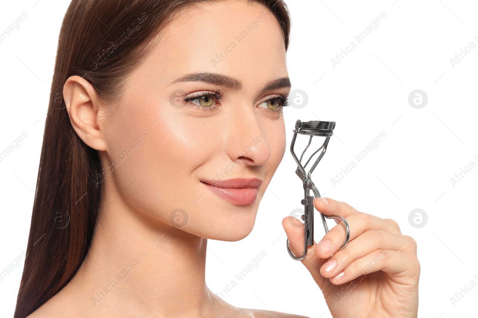 Photo of Woman with eyelash curler on white background