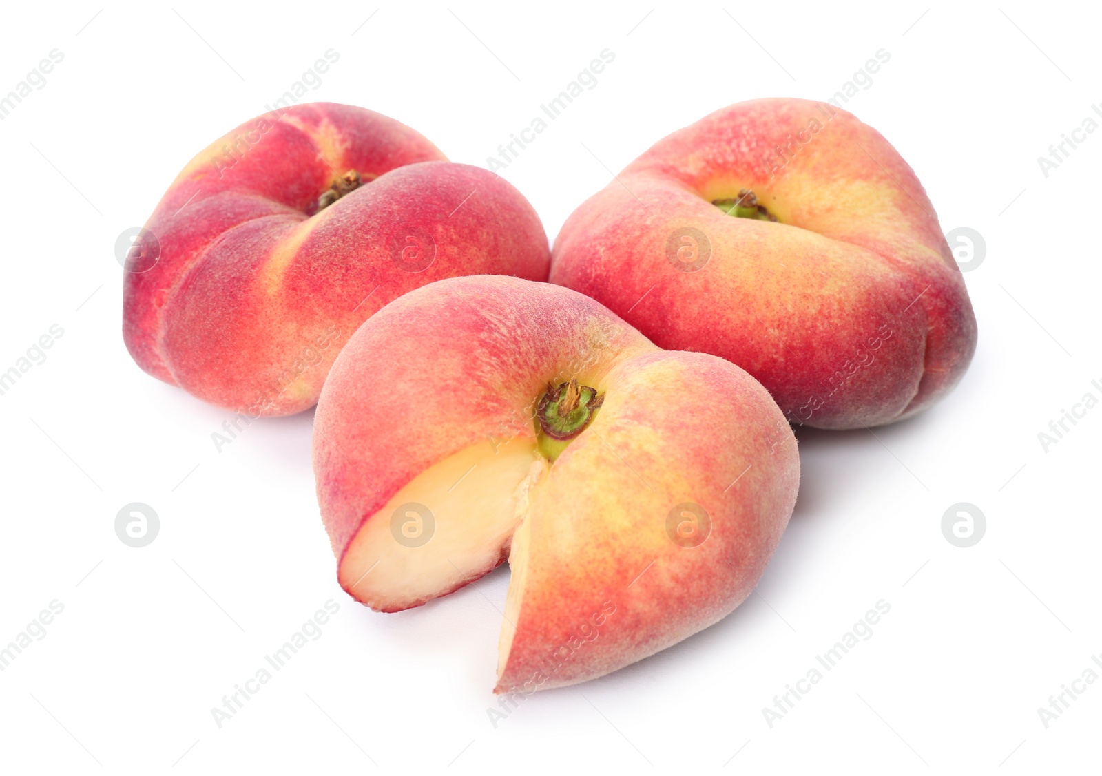 Photo of Fresh ripe donut peaches on white background