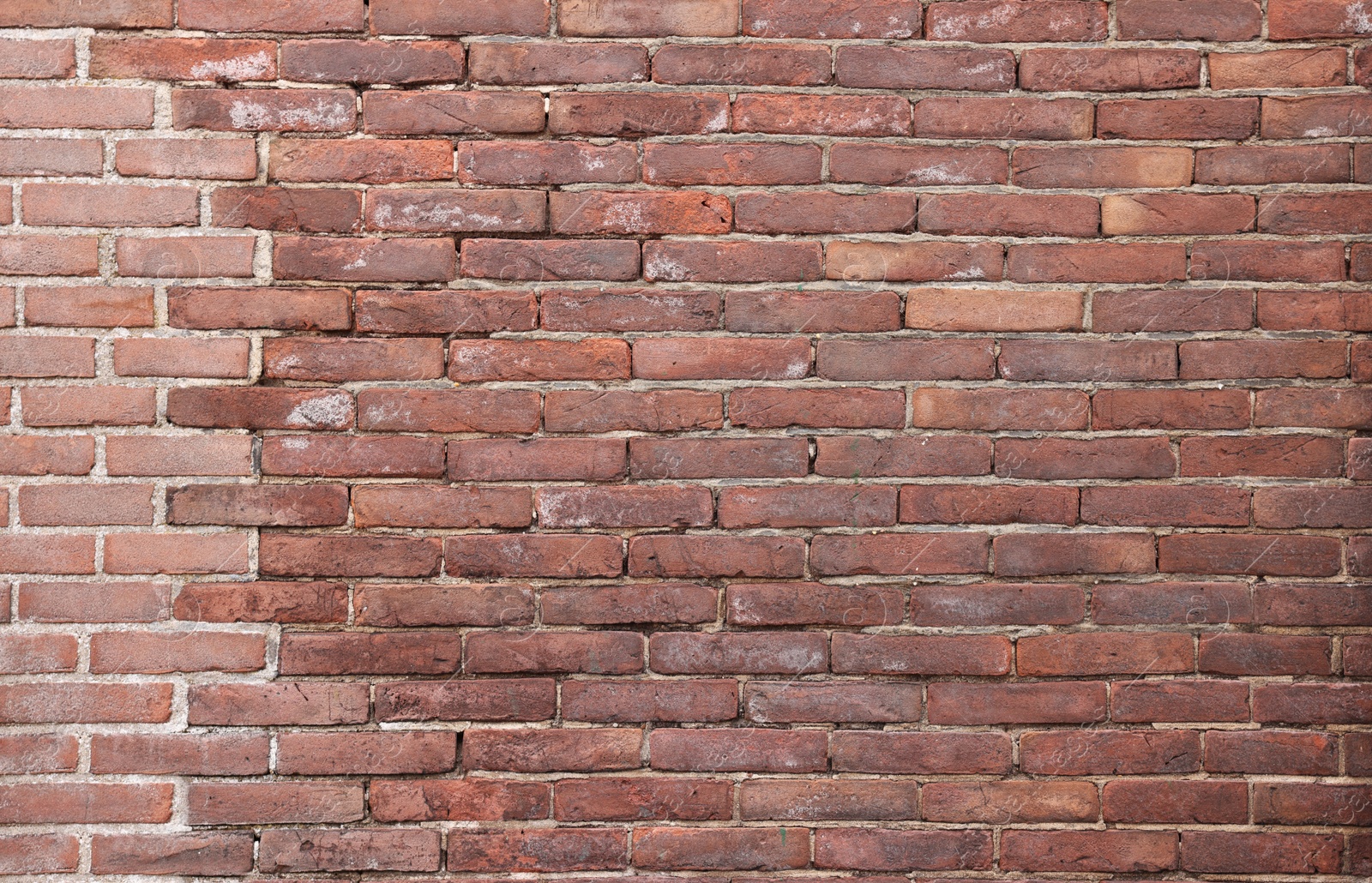 Photo of Texture of old red brick wall as background