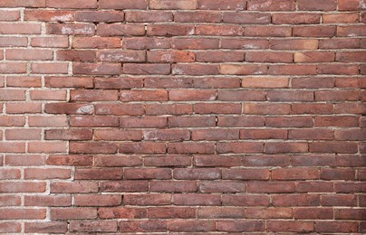 Texture of old red brick wall as background