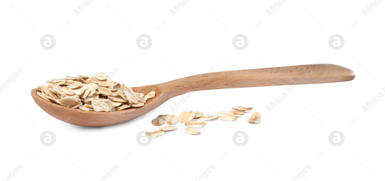 Photo of Raw oatmeal and wooden spoon on white background