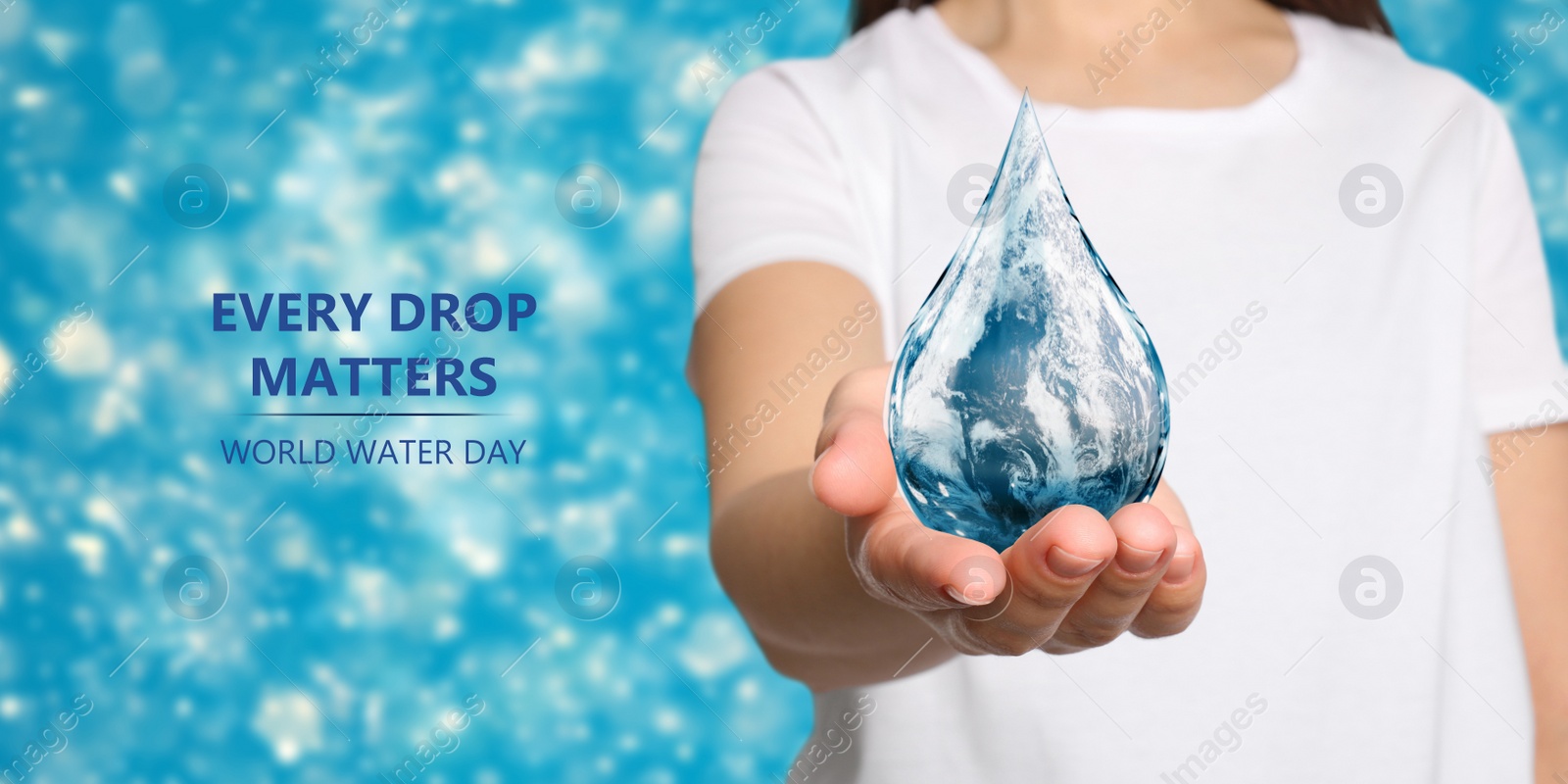 Image of World Water Day. Woman holding icon of drop with Earth image inside on blurred background, closeup