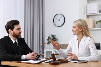 Woman having meeting with lawyer in office