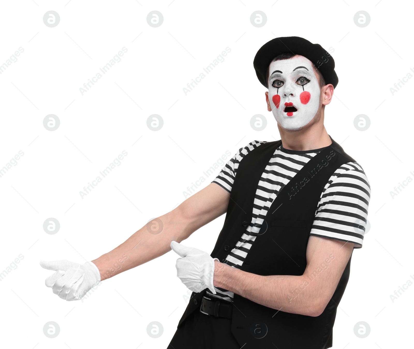 Photo of Funny mime artist in beret posing on white background