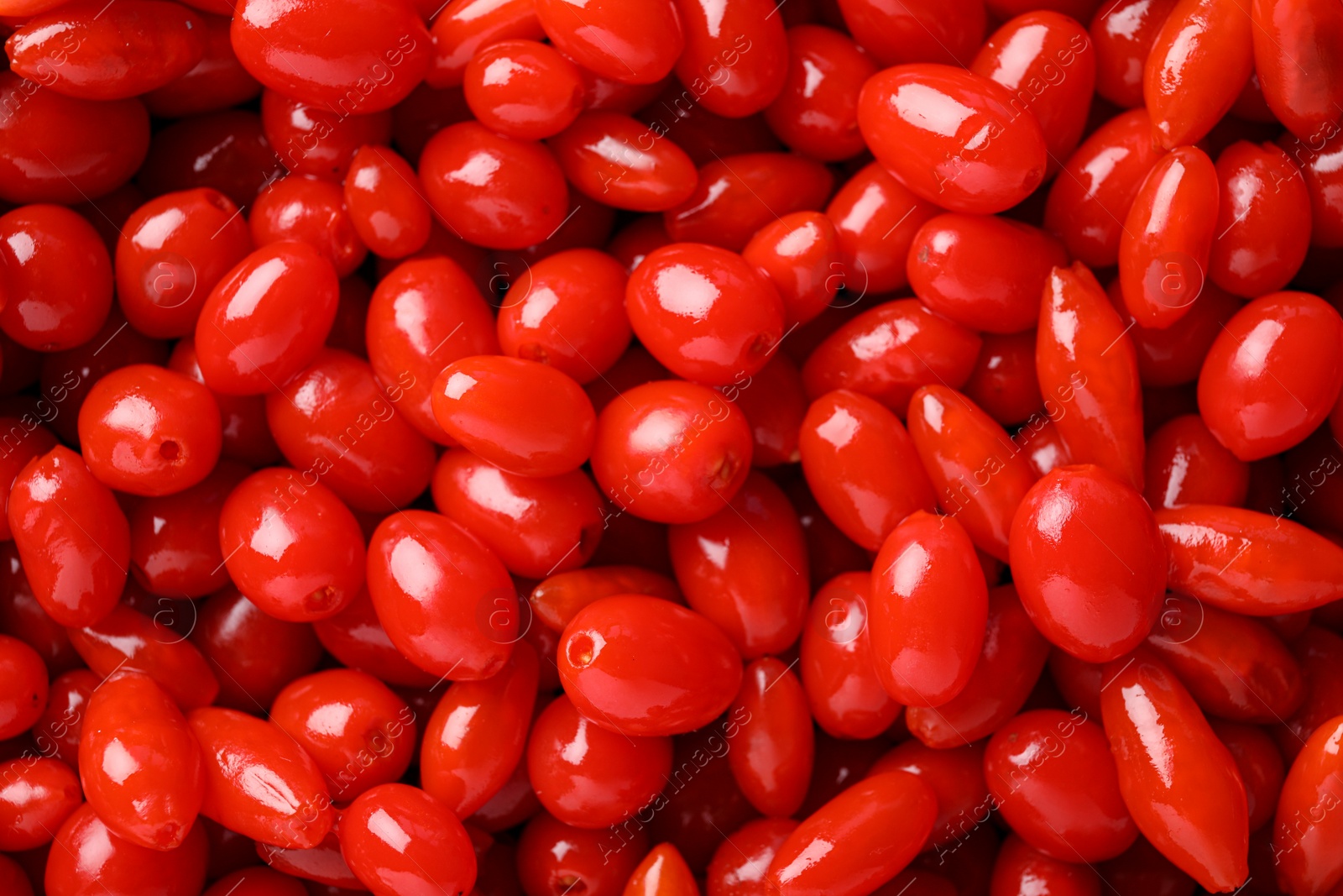 Photo of Fresh ripe goji berries as background, top view