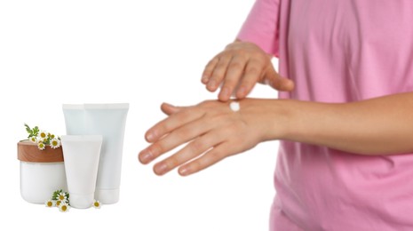 Image of Woman applying cream and containers of hand care cosmetic products on white background, closeup