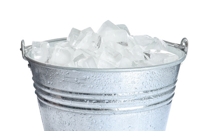 Photo of Metal bucket with ice cubes isolated on white