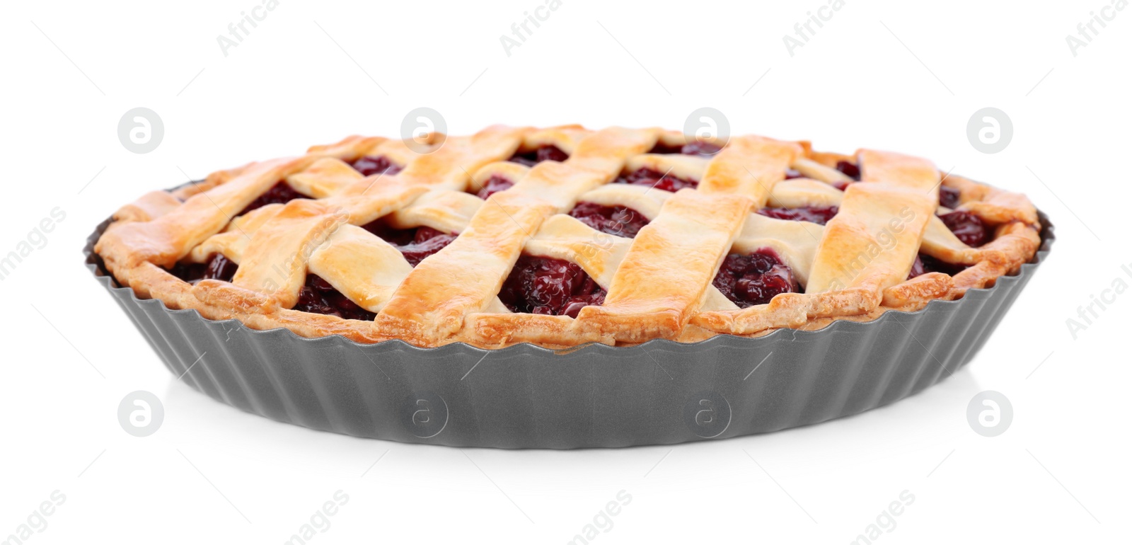 Photo of Delicious fresh cherry pie in baking dish isolated on white