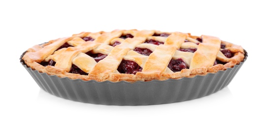 Delicious fresh cherry pie in baking dish isolated on white