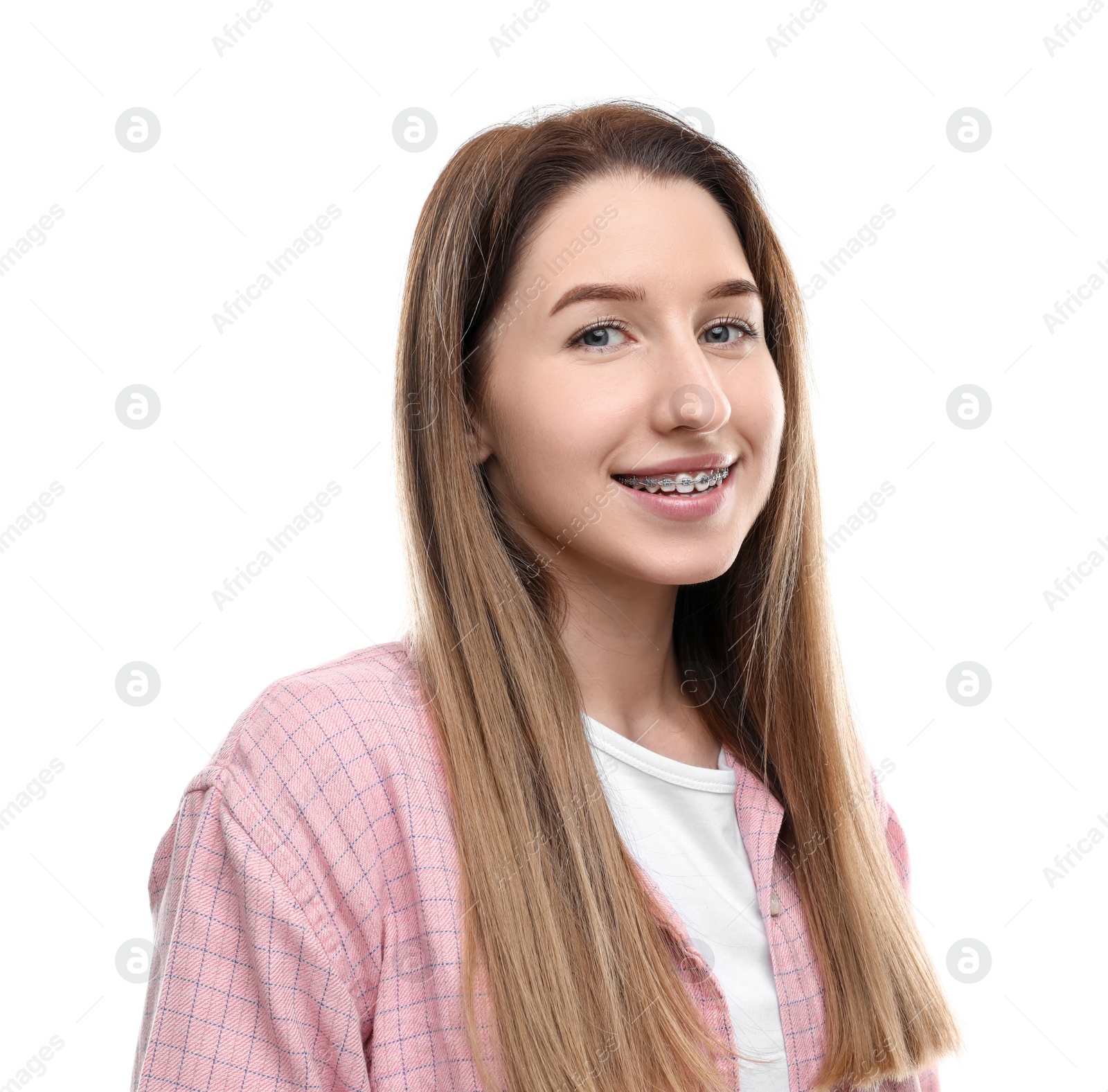 Photo of Portrait of smiling woman with dental braces on white background