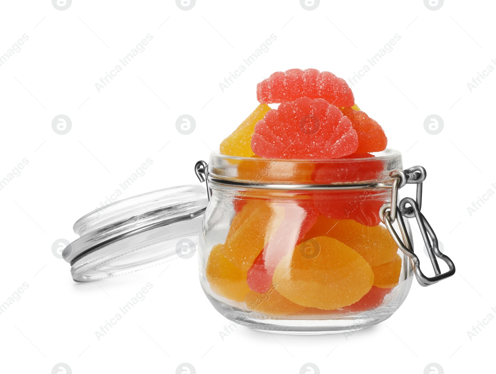 Photo of Many jelly candies in glass jar isolated on white