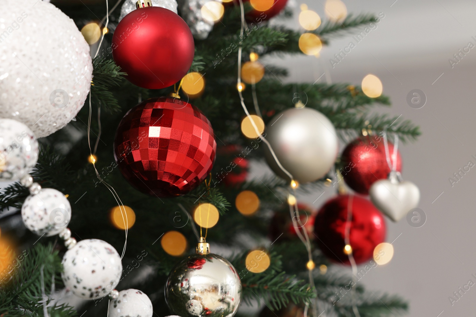 Photo of Beautiful Christmas tree with ornaments, closeup view