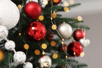 Beautiful Christmas tree with ornaments, closeup view