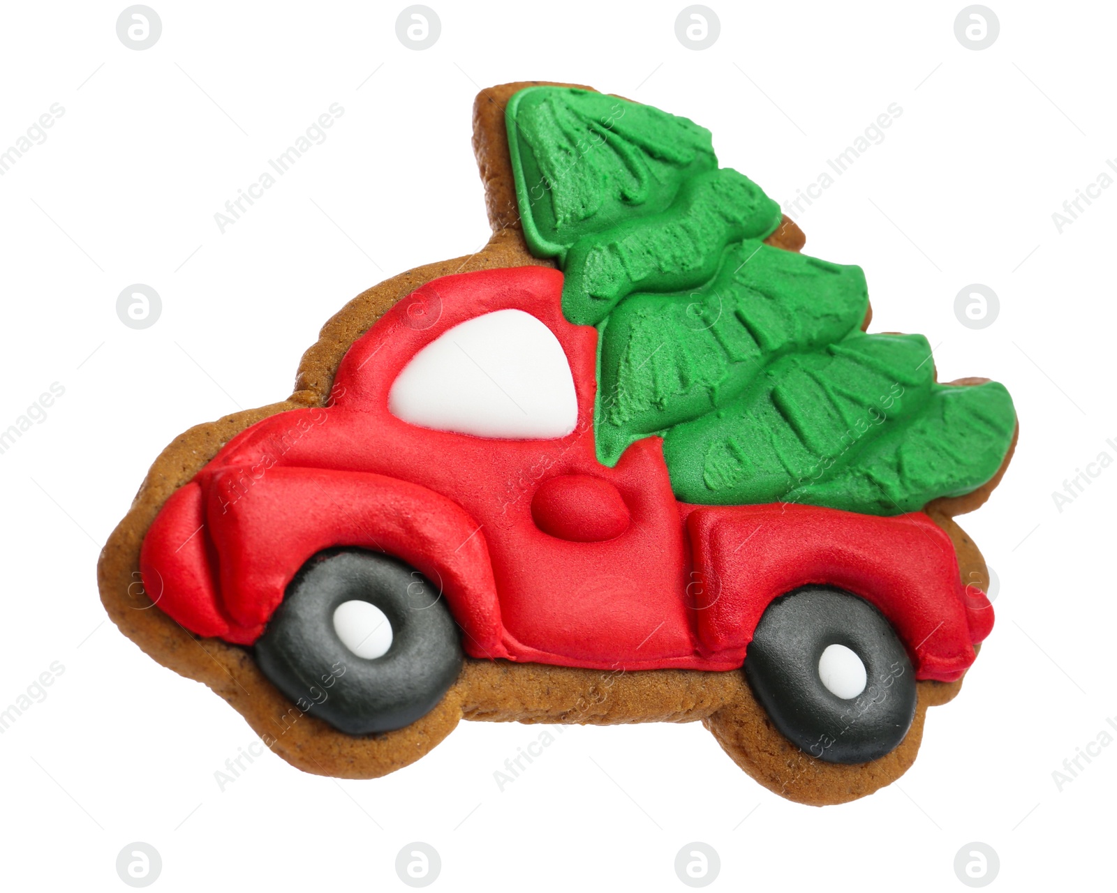 Photo of Christmas cookie in shape of car with fir tree isolated on white