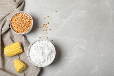 Flat lay composition with corn starch and space for text on grey background