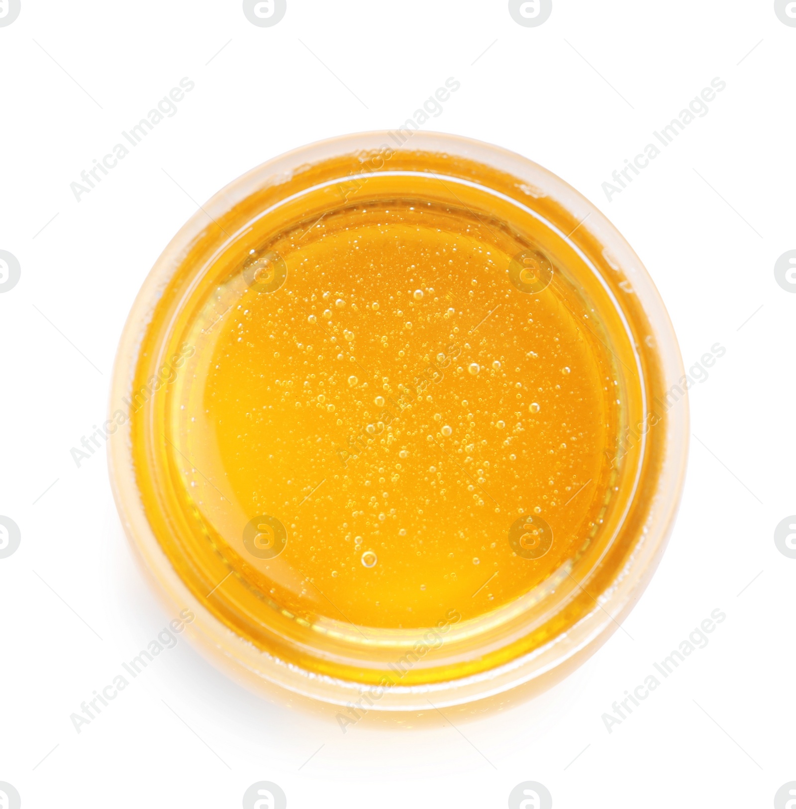 Photo of Jar of organic honey isolated on white, top view