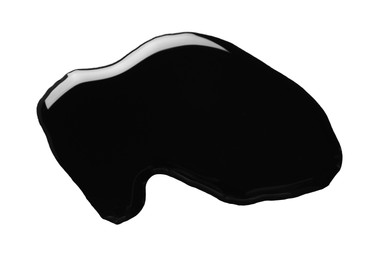 Photo of Black glossy oil blob isolated on white, top view