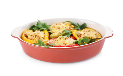 Photo of Tasty stuffed bell peppers in baking dish isolated on white