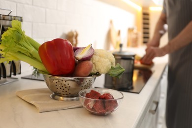 Homemade bouillon recipe. Fresh vegetables and meat in kitchen