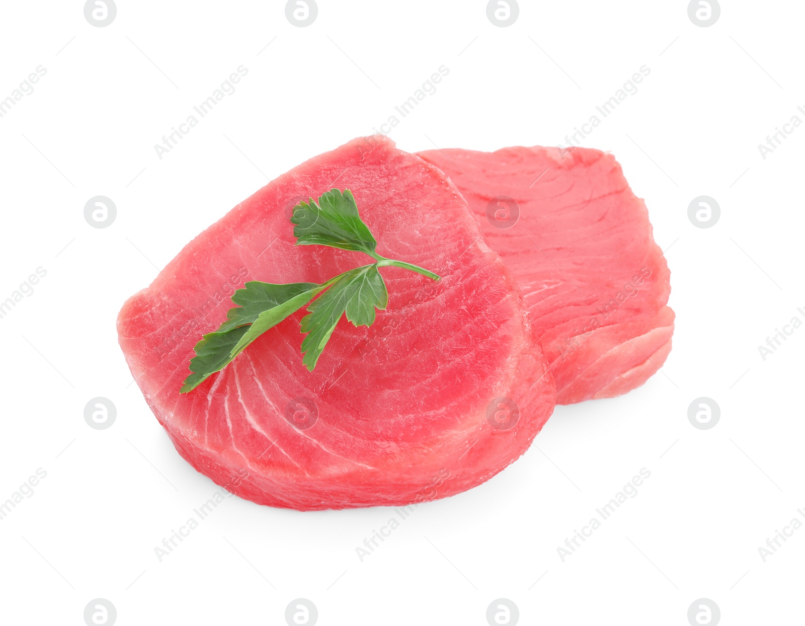 Photo of Fresh raw tuna fillets with parsley on white background