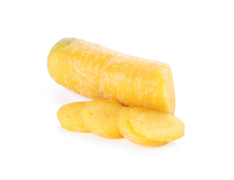 Photo of Pieces of raw yellow carrot isolated on white