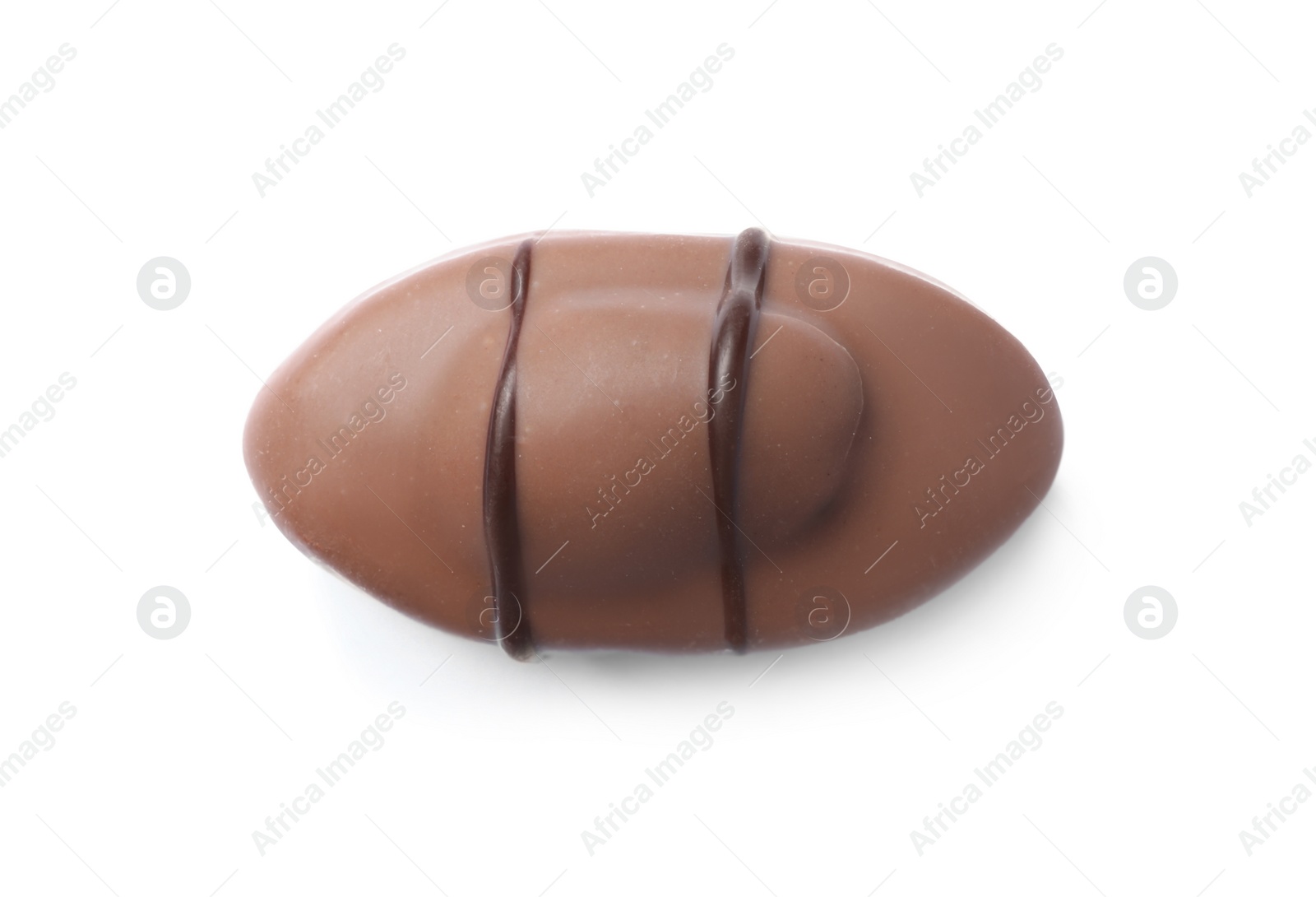 Photo of Delicious milk chocolate candy with nut isolated on white, top view
