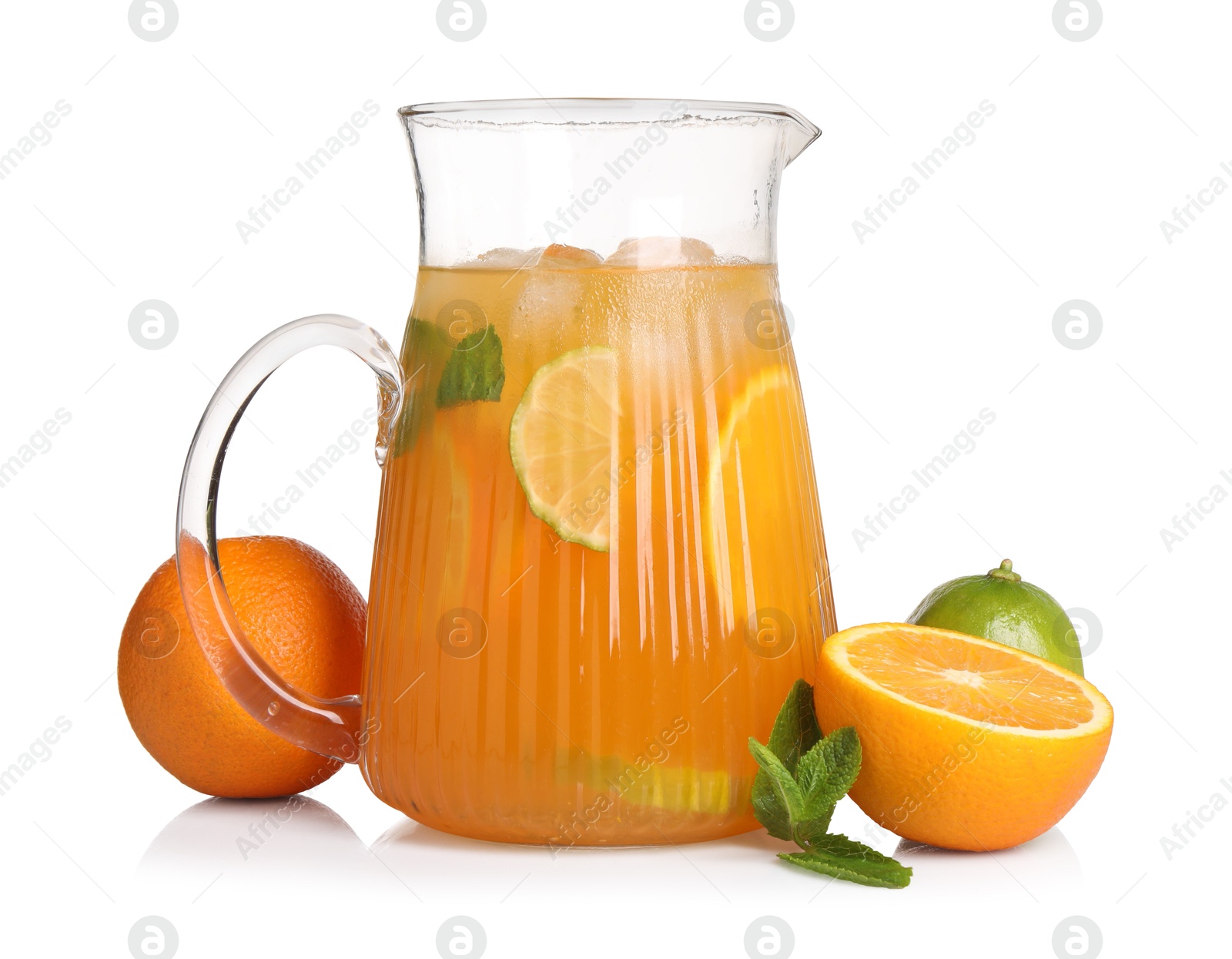 Photo of Freshly made lemonade in jug, mint and citrus fruits isolated on white