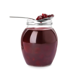 Photo of Jar and spoon of delicious pickled cherries isolated on white