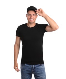 Photo of Happy man in black cap and tshirt on white background. Mockup for design