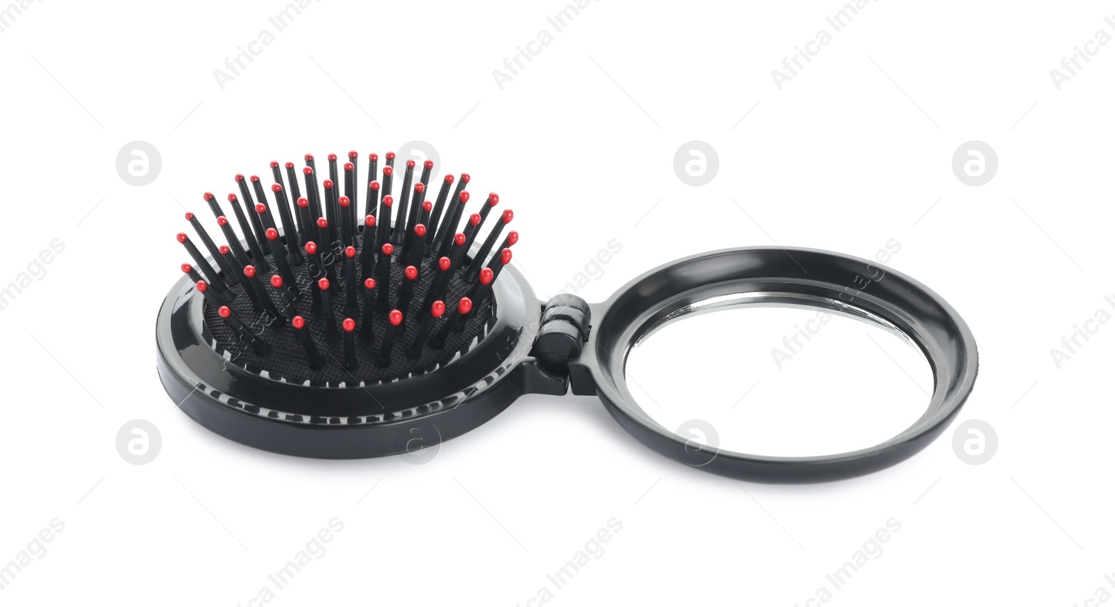 Photo of Round folding hair brush with mirror isolated on white