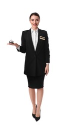 Photo of Happy young receptionist in uniform holding service bell on white background