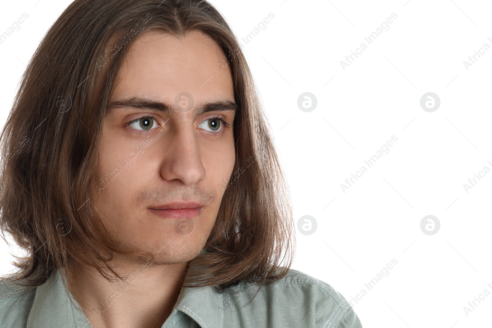 Photo of Portrait of young man on white background, closeup