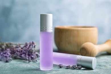 Photo of Composition with lavender flowers and natural cosmetic on table