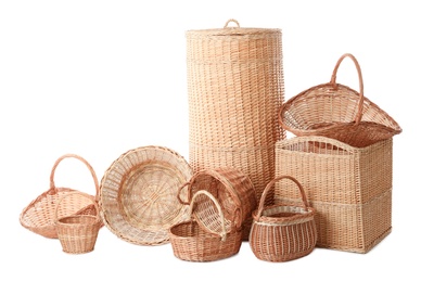 Photo of Many different wicker baskets on white background