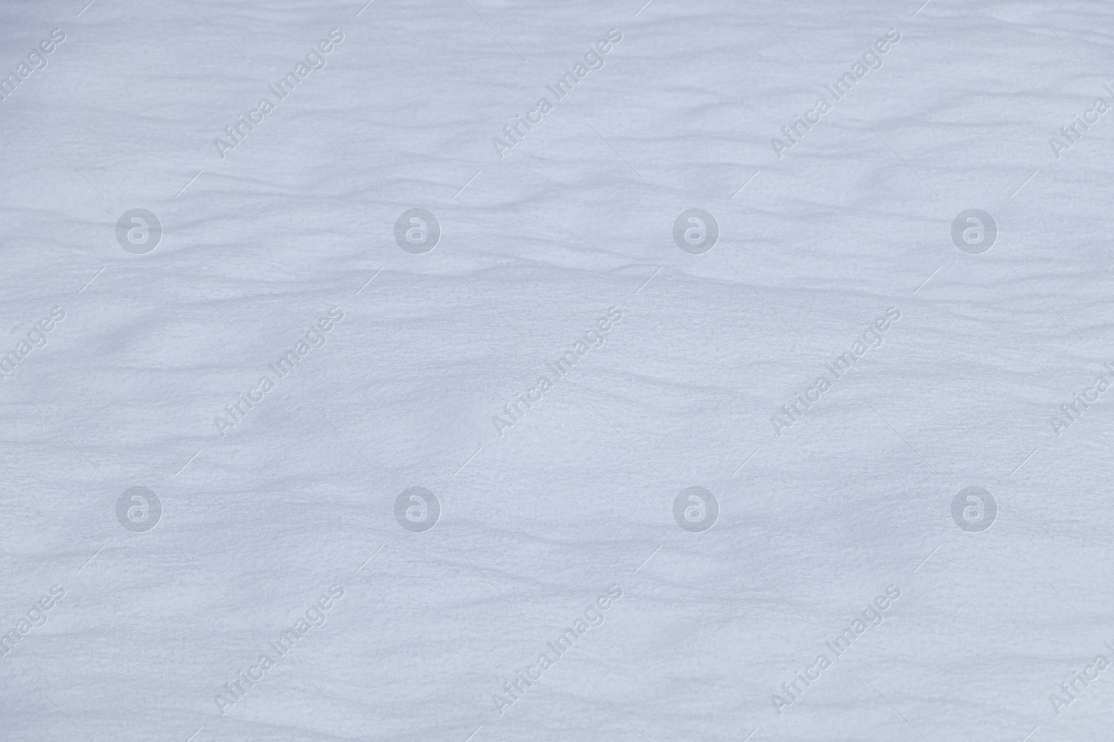 Photo of Beautiful shiny snow as background, closeup view