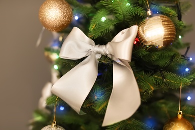 Photo of Beautiful Christmas tree with stylish decor, closeup