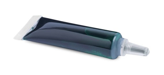 Photo of Tube with green food coloring on white background