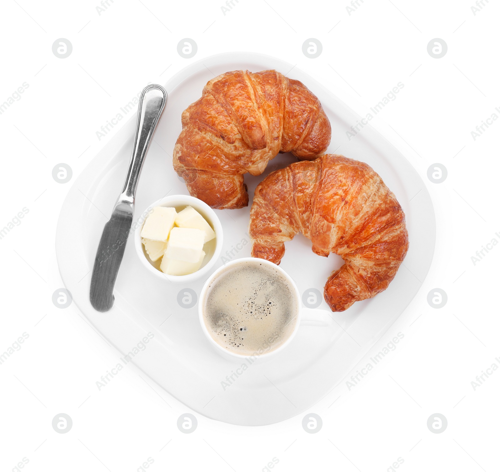 Photo of Tasty breakfast. Cup of coffee, butter and fresh croissants isolated on white, top view