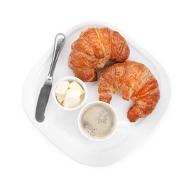 Photo of Tasty breakfast. Cup of coffee, butter and fresh croissants isolated on white, top view