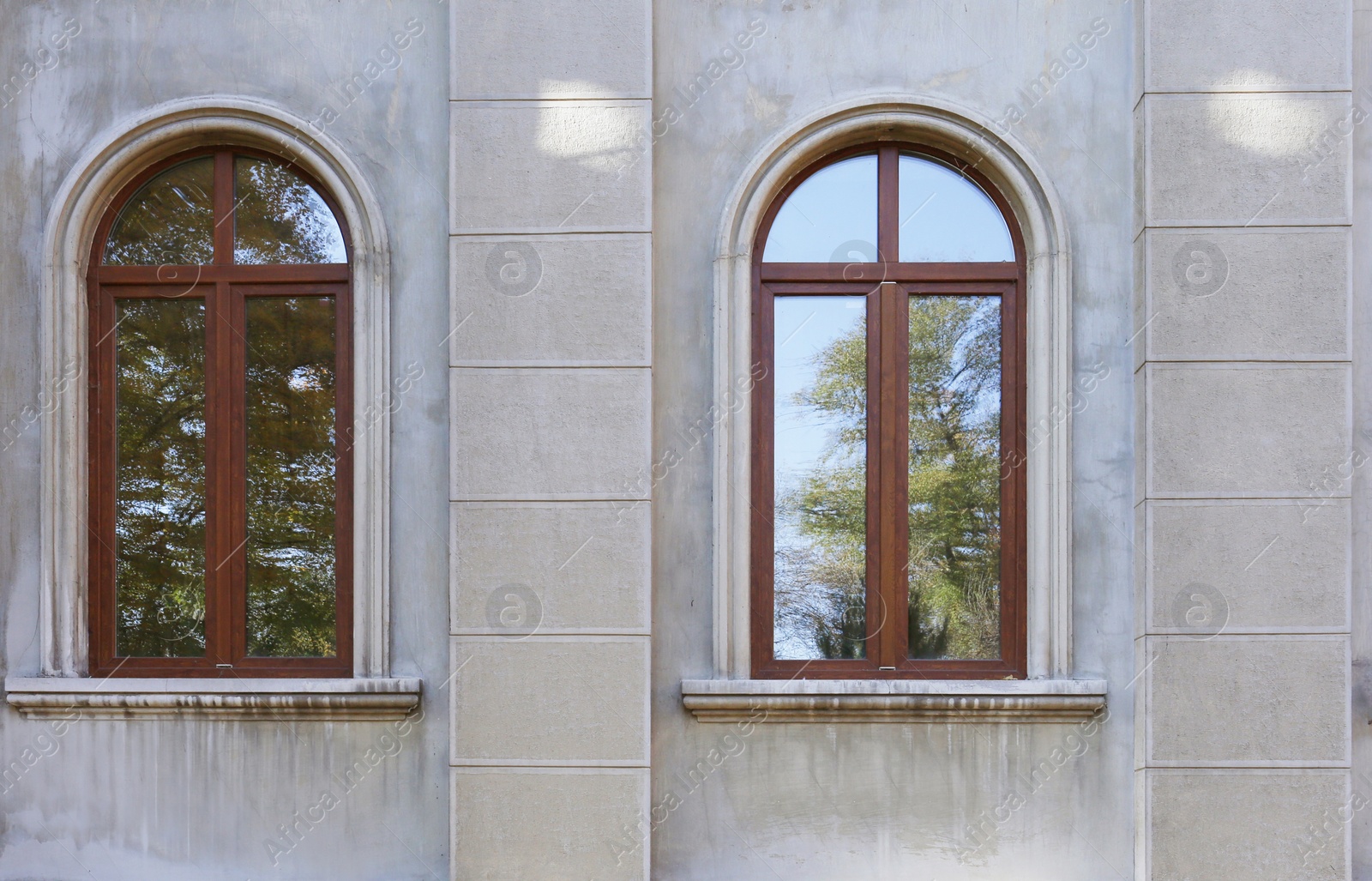 Photo of View of wall with modern arch windows