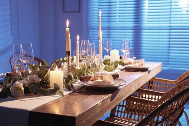 Festive table setting with beautiful tableware and decor indoors