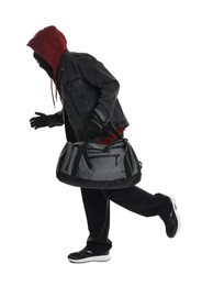 Photo of Thief in balaclava with bag running on white background