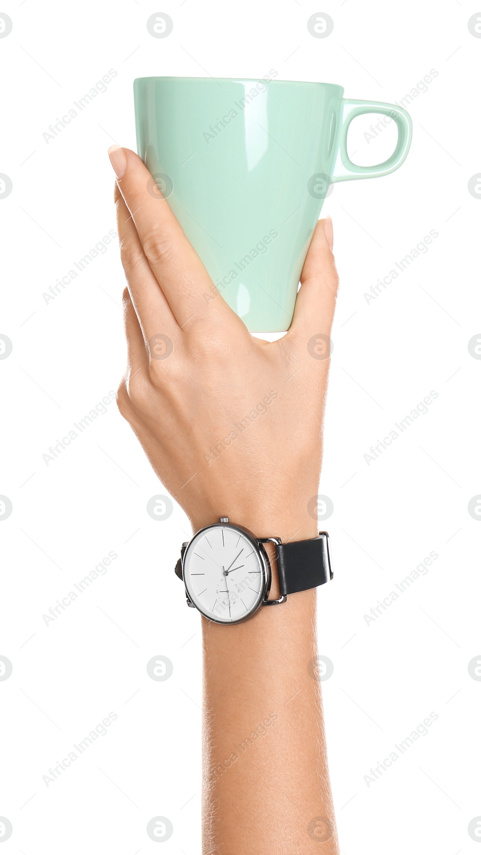 Photo of Woman holding elegant green cup on white background, closeup